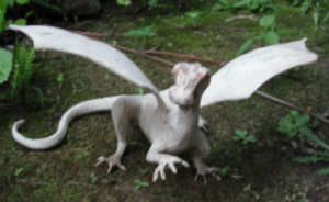 A model dragon made out of car bog