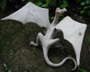 A model dragon made out of car bog