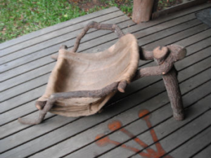 A bush chair made from tree branches
