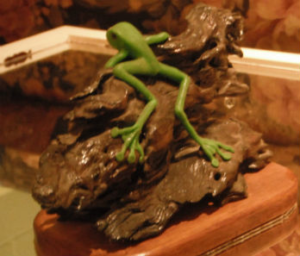 Frog on a log sculpture